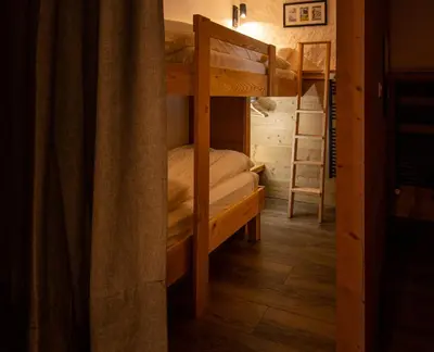 Ein Etagenbett oder Etagenbetten in einem Zimmer der Unterkunft La Bergère
