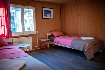 Ein Bett oder Betten in einem Zimmer der Unterkunft Uncle Eric's Chalet