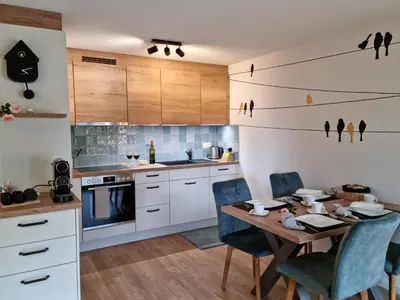 Küche/Küchenzeile in der Unterkunft Gemütliche Ferienwohnung zwischen See und Bergen