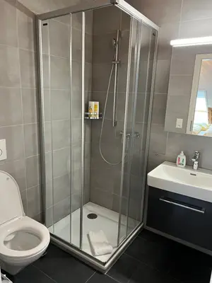 Ein Badezimmer in der Unterkunft Studio JASMINE interlaken