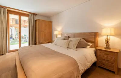 Ein Bett oder Betten in einem Zimmer der Unterkunft The Terrace Apartment - GRINDELHOMES