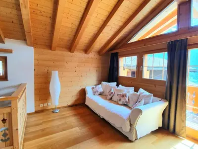 Ein Bett oder Betten in einem Zimmer der Unterkunft Magnifique et cosy chalet La Marmotte, St-Martin, Val d'Hérens