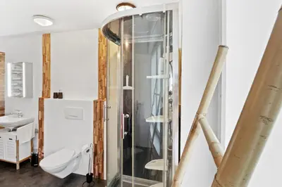 Ein Badezimmer in der Unterkunft Appartement confortable avec un sauna