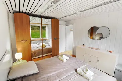 Ein Bett oder Betten in einem Zimmer der Unterkunft Appartement confortable avec un sauna