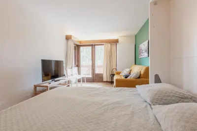 Ein Bett oder Betten in einem Zimmer der Unterkunft Cosy and modern apartment closed to the ski lift