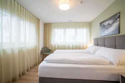 Ein Bett oder Betten in einem Zimmer der Unterkunft Modern City Apartments