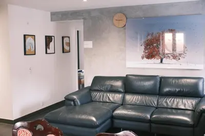 Ein Sitzbereich in der Unterkunft Today Appartement Famille - Ski Golf Business