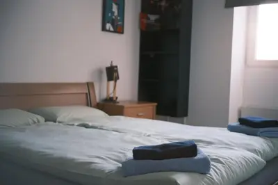 Ein Bett oder Betten in einem Zimmer der Unterkunft Today Appartement Famille - Ski Golf Business