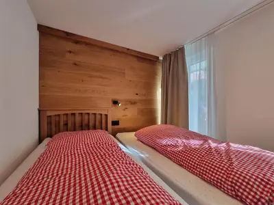 Ein Bett oder Betten in einem Zimmer der Unterkunft Rio ski-in, ski-out