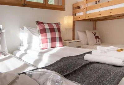 Ein Bett oder Betten in einem Zimmer der Unterkunft Chalet Stella Alpina