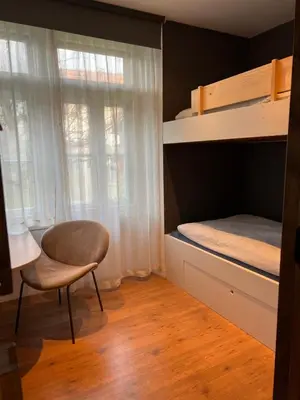 Ein Bett oder Betten in einem Zimmer der Unterkunft Chalet Mignon - your vacation oasis at Lake Brienz
