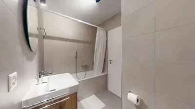 Ein Badezimmer in der Unterkunft Sublime modern family apartment of 2 bedrooms