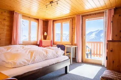 Ein Bett oder Betten in einem Zimmer der Unterkunft Chalet Weisshorn 3