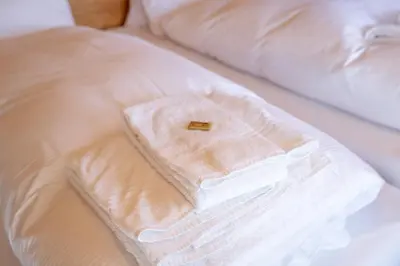Ein Bett oder Betten in einem Zimmer der Unterkunft Chalet Weisshorn 3