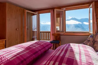 Ein Bett oder Betten in einem Zimmer der Unterkunft Chalet Weisshorn 4