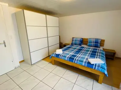 Ein Bett oder Betten in einem Zimmer der Unterkunft Matten Central Residences
