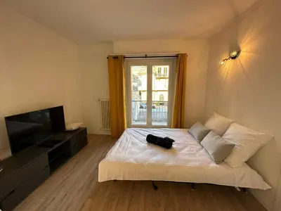 Ein Bett oder Betten in einem Zimmer der Unterkunft Sion Central Station proche toutes commodites
