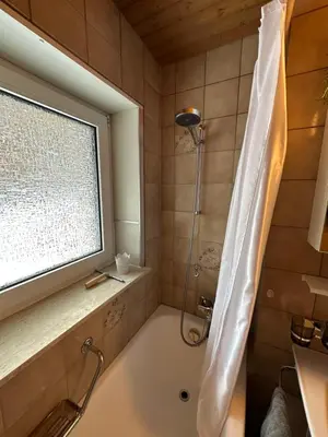 Ein Badezimmer in der Unterkunft Dachwohnung mit Charme im Haus Luchre, Zermatt