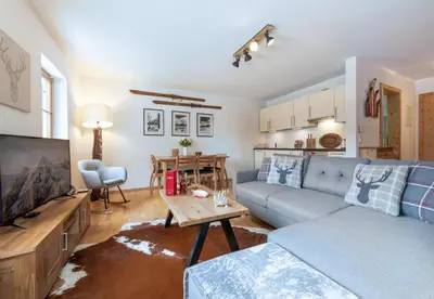 Ein Sitzbereich in der Unterkunft Chalet Alpina
