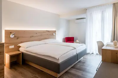 Ein Bett oder Betten in einem Zimmer der Unterkunft Hotel Zur Traube