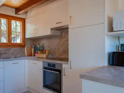 Küche/Küchenzeile in der Unterkunft Chalet Anusach by Interhome