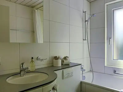 Ein Badezimmer in der Unterkunft Apartment Chalet Wyssefluh by Interhome