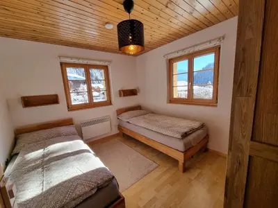 Ein Bett oder Betten in einem Zimmer der Unterkunft Ferienhaus Andrea AD0