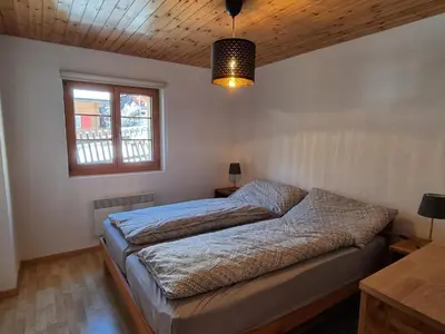 Ein Bett oder Betten in einem Zimmer der Unterkunft Ferienhaus Andrea AD0