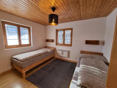 Ein Bett oder Betten in einem Zimmer der Unterkunft Ferienhaus Andrea AD0