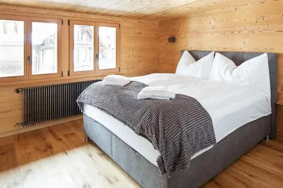 Ein Bett oder Betten in einem Zimmer der Unterkunft Chalet Swiss Alps