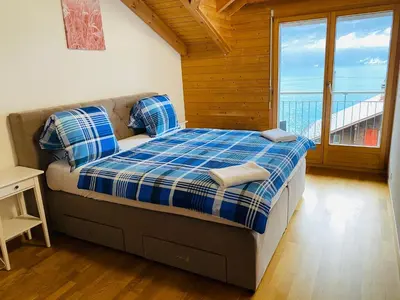 Ein Bett oder Betten in einem Zimmer der Unterkunft LakeSide Villa - 18