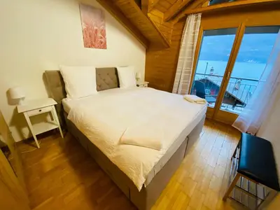 Ein Bett oder Betten in einem Zimmer der Unterkunft Lake View Residence