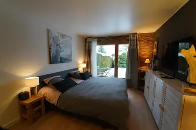 Ein Bett oder Betten in einem Zimmer der Unterkunft Superbe studio avec parking privé