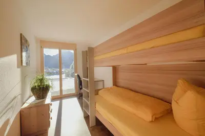 Ein Bett oder Betten in einem Zimmer der Unterkunft Châlet Bärgfride