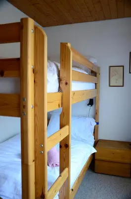 Ein Bett oder Betten in einem Zimmer der Unterkunft Charming and cosy apartment (sleeps 4-6 people) in a beautiful mountain village