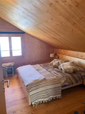 Ein Bett oder Betten in einem Zimmer der Unterkunft Chalet , Thyon Les Collons, 4 Vallées