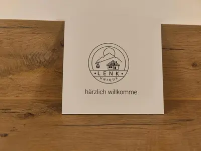 Ein Zertifikat, Auszeichnung, Logo oder anderes Dokument, das in der Unterkunft Apartment Lenk Unique by Interhome ausgestellt ist