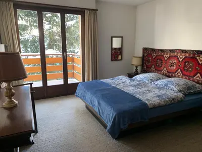 Ein Bett oder Betten in einem Zimmer der Unterkunft Peak-view Crans-Montana