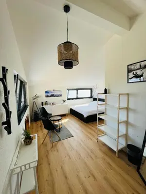 Ein Bett oder Betten in einem Zimmer der Unterkunft Chambre double privative et indépendante