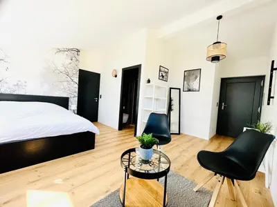 Ein Bett oder Betten in einem Zimmer der Unterkunft Chambre double privative et indépendante