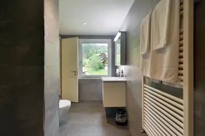 Ein Badezimmer in der Unterkunft Bellevue Hotel & Apartments