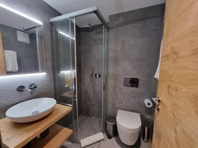 Ein Badezimmer in der Unterkunft Riverside 2nd Floor South