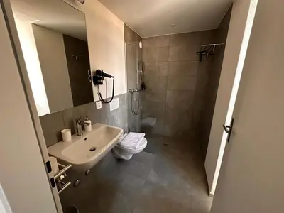 Ein Badezimmer in der Unterkunft Aparthotel Krone - Self Check-In