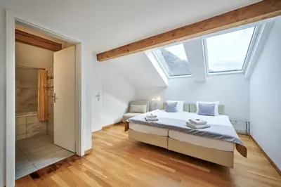 Ein Bett oder Betten in einem Zimmer der Unterkunft Aparthotel Krone - Self Check-In