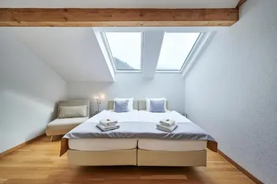 Ein Bett oder Betten in einem Zimmer der Unterkunft Aparthotel Krone - Self Check-In
