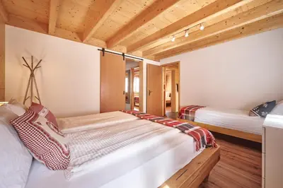 Ein Bett oder Betten in einem Zimmer der Unterkunft Chalet Lauterbrunnen