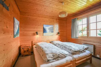 Ein Bett oder Betten in einem Zimmer der Unterkunft Chalet Lieke Apartment