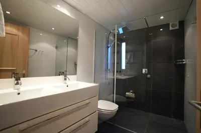 Ein Badezimmer in der Unterkunft Chalet Quattro