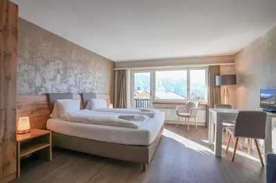 Ein Bett oder Betten in einem Zimmer der Unterkunft Rhodania 62