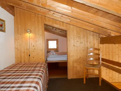 Ein Bett oder Betten in einem Zimmer der Unterkunft Apartment Chalet Grindelwaldgletscher by Interhome